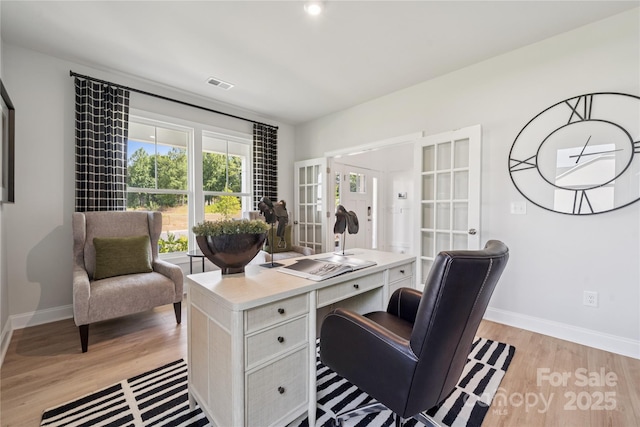424 Balboa St, Matthews, NC 28104 - home office with french doors and light wood-style floors