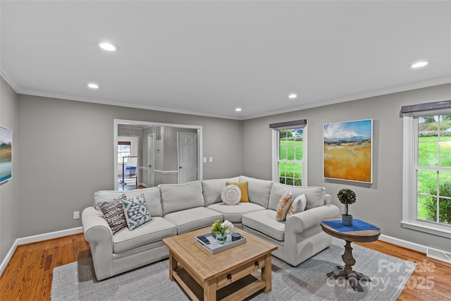 2418 Ainsdale Rd, Charlotte, NC 28226 - living room featuring baseboards, recessed lighting, wood finished floors, and ornamental molding