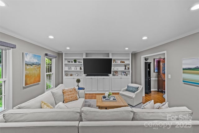 2418 Ainsdale Rd, Charlotte, NC 28226 - living area featuring light wood-style floors, crown molding, and recessed lighting