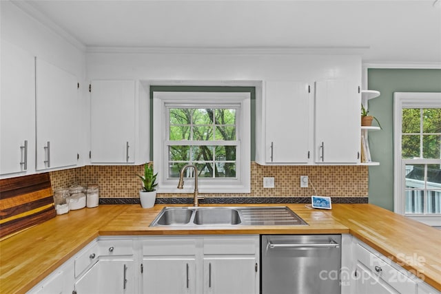 2418 Ainsdale Rd, Charlotte, NC 28226 - kitchen with dishwasher, white cabinets, ornamental molding, tasteful backsplash, and butcher block counters