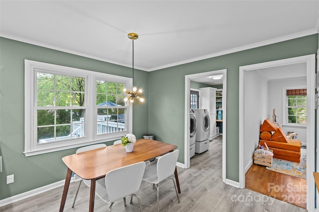 2418 Ainsdale Rd, Charlotte, NC 28226 - dining space with separate washer and dryer, healthy amount of natural light, light wood-type flooring, and ornamental molding