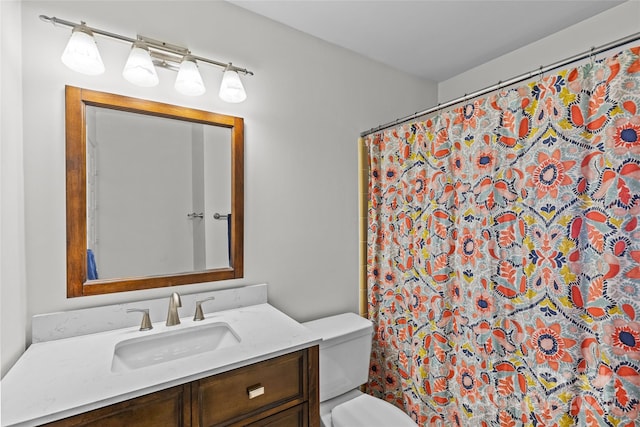2418 Ainsdale Rd, Charlotte, NC 28226 - bathroom with vanity, toilet, and a shower with curtain