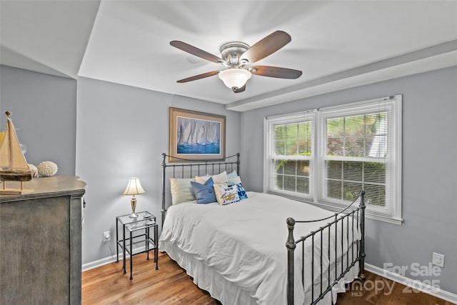2418 Ainsdale Rd, Charlotte, NC 28226 - bedroom with baseboards, wood finished floors, and ceiling fan