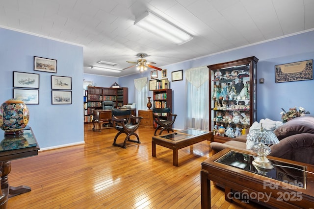 1287 Queensgate St, Gastonia, NC 28054 - living area featuring ornamental molding, light wood-style flooring, and attic access