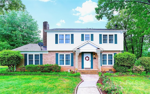 1287 Queensgate St, Gastonia, NC 28054 - colonial house featuring a chimney, brick siding, and a front yard