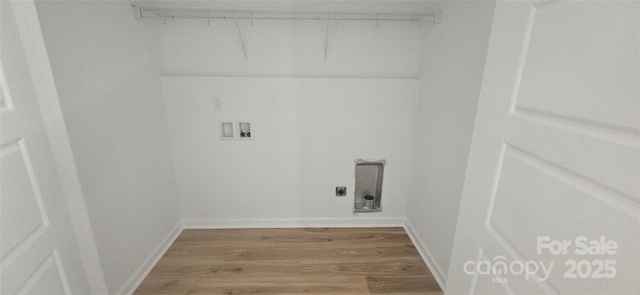 laundry room with wood finished floors, hookup for a washing machine, electric dryer hookup, baseboards, and laundry area