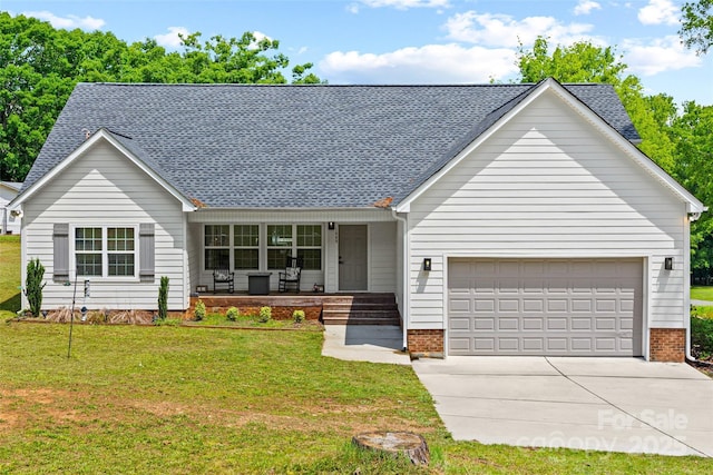 1009 Rainbow Cir, Catawba, SC 29704 - ranch-style house with a porch, roof with shingles, an attached garage, and concrete driveway