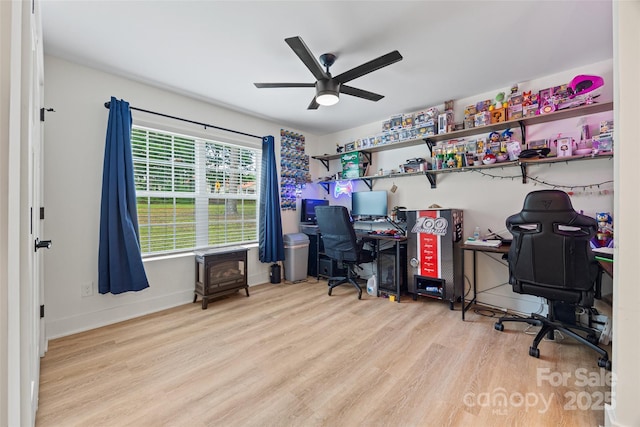 1009 Rainbow Cir, Catawba, SC 29704 - home office with ceiling fan, wood finished floors, and baseboards
