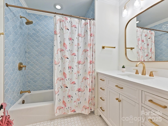 bathroom with crown molding, shower / bath combo with shower curtain, and vanity