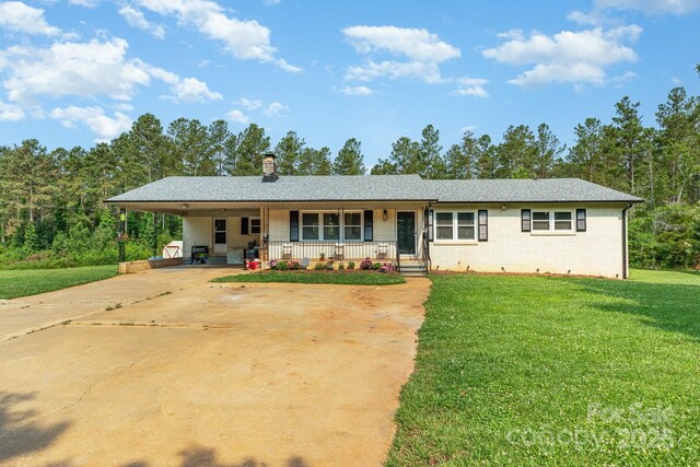 3603 Ken Mcentire Rd, Lawndale, NC 28090 - ranch-style home featuring covered porch, a front yard, concrete driveway, and brick siding