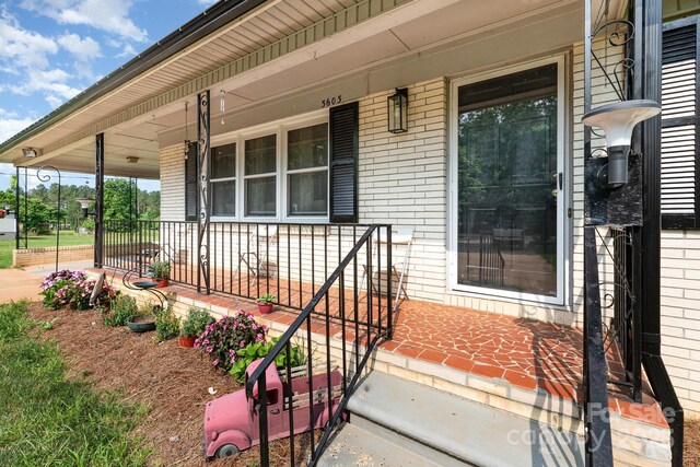 3603 Ken Mcentire Rd, Lawndale, NC 28090 - view of exterior entry with covered porch and brick siding
