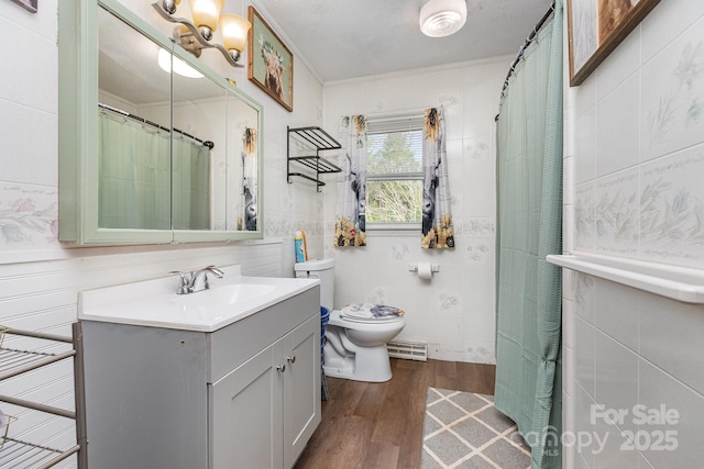 3603 Ken Mcentire Rd, Lawndale, NC 28090 - bathroom featuring wood finished floors, toilet, tile walls, vanity, and crown molding