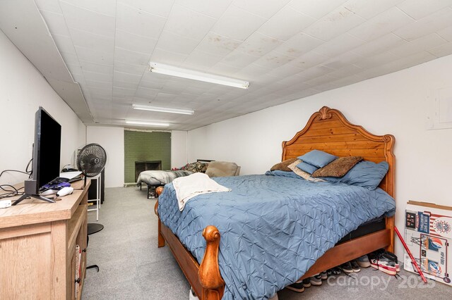 3603 Ken Mcentire Rd, Lawndale, NC 28090 - carpeted bedroom with a brick fireplace