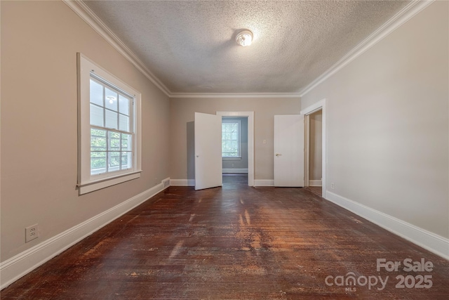unfurnished bedroom with wood finished floors, a textured ceiling, baseboards, and ornamental molding