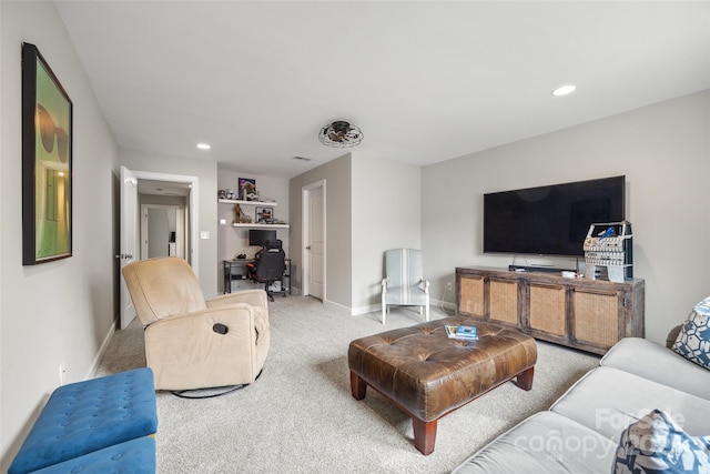 carpeted living room with baseboards and recessed lighting