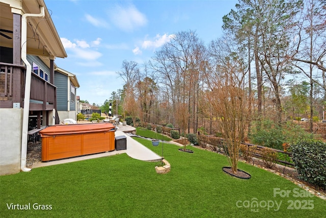 view of yard featuring a hot tub