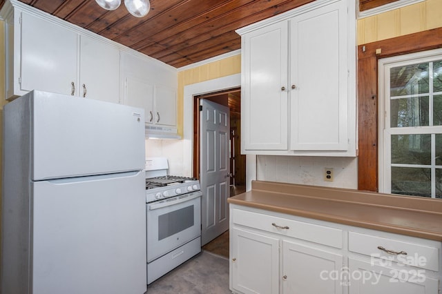 kitchen with white appliances, white cabinetry, and wooden ceiling
