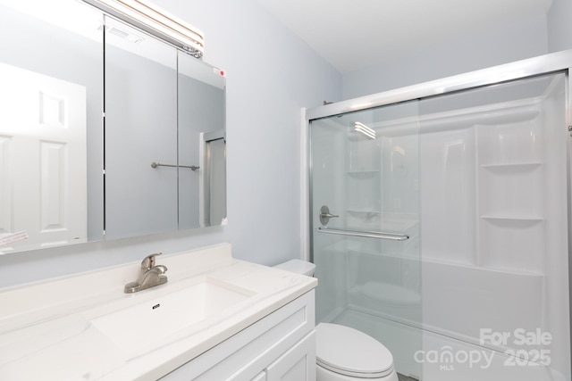 1455 Fieldcrest Cir, Rock Hill, SC 29732 - bathroom with a shower stall, toilet, and vanity
