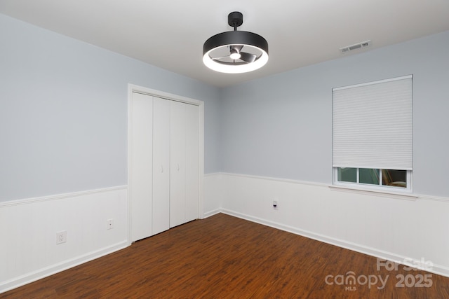 1455 Fieldcrest Cir, Rock Hill, SC 29732 - spare room with wood finished floors, visible vents, and baseboards