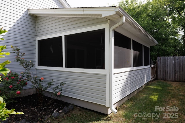 1455 Fieldcrest Cir, Rock Hill, SC 29732 - view of home's exterior with a sunroom and fence