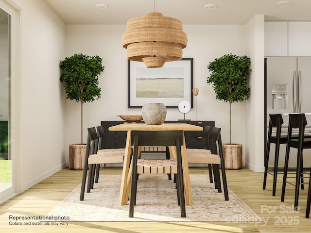 2107 Columbidae Ln, Gastonia, NC 28052 - dining area with light wood-style floors and baseboards