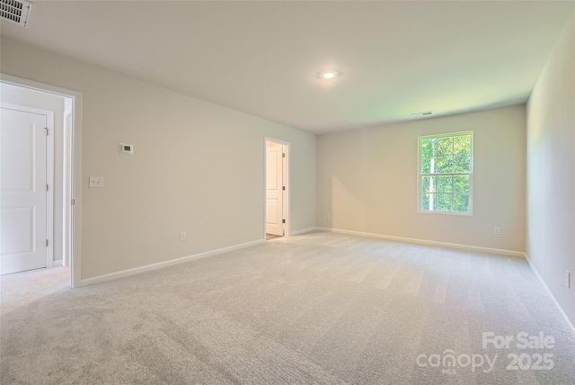 2107 Columbidae Ln, Gastonia, NC 28052 - empty room featuring light carpet and recessed lighting