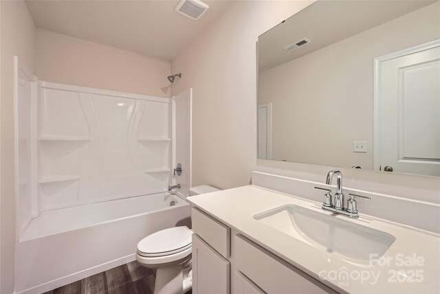 2107 Columbidae Ln, Gastonia, NC 28052 - bathroom featuring vanity, wood finished floors, and bathtub / shower combination