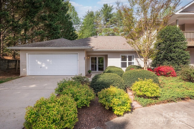 206 Carrington Pl, Arden, NC 28704 - ranch-style house featuring driveway, a shingled roof, and a garage