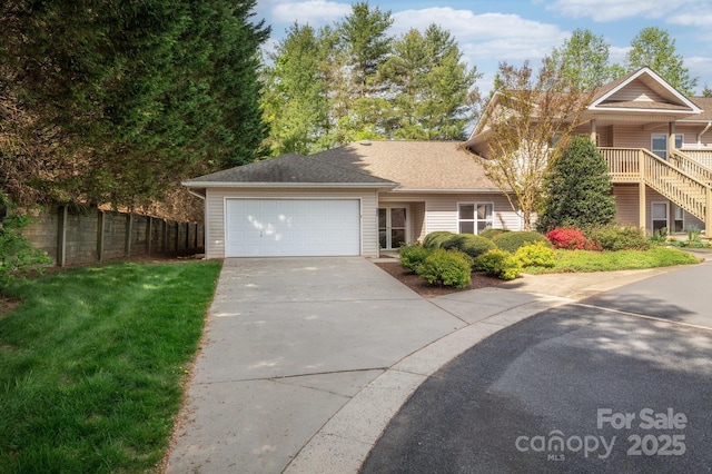 206 Carrington Pl, Arden, NC 28704 - traditional home featuring fence, driveway, a front yard, and an attached garage
