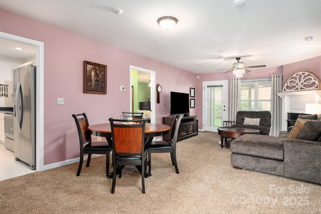 206 Carrington Pl, Arden, NC 28704 - dining area featuring ceiling fan, baseboards, and light carpet