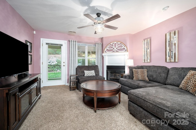 206 Carrington Pl, Arden, NC 28704 - living area featuring a ceiling fan, visible vents, and light colored carpet