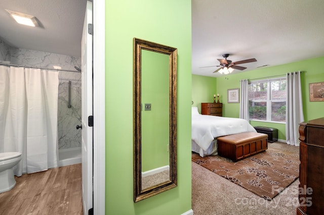 206 Carrington Pl, Arden, NC 28704 - bedroom with a textured ceiling, visible vents, ceiling fan, and wood finished floors