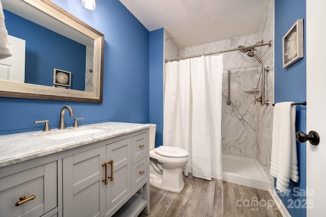 206 Carrington Pl, Arden, NC 28704 - bathroom with wood finished floors, toilet, a shower with shower curtain, and vanity