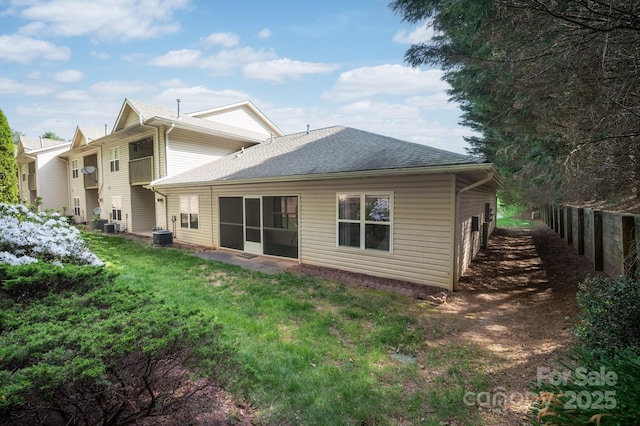 206 Carrington Pl, Arden, NC 28704 - rear view of house featuring fence, central air condition unit, and a shingled roof