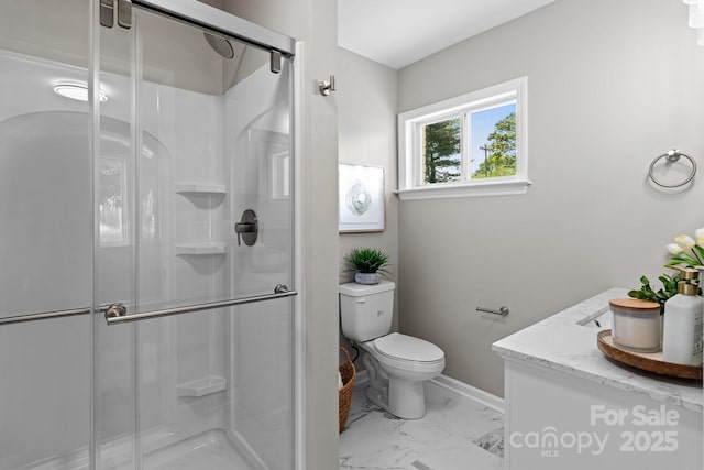 bathroom featuring toilet, baseboards, a shower stall, and marble finish floor