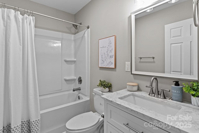 bathroom with vanity, shower / bathtub combination with curtain, and toilet