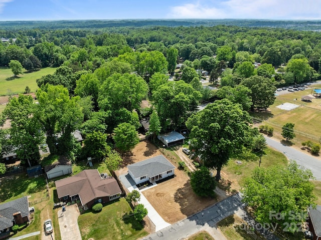 drone / aerial view with a view of trees