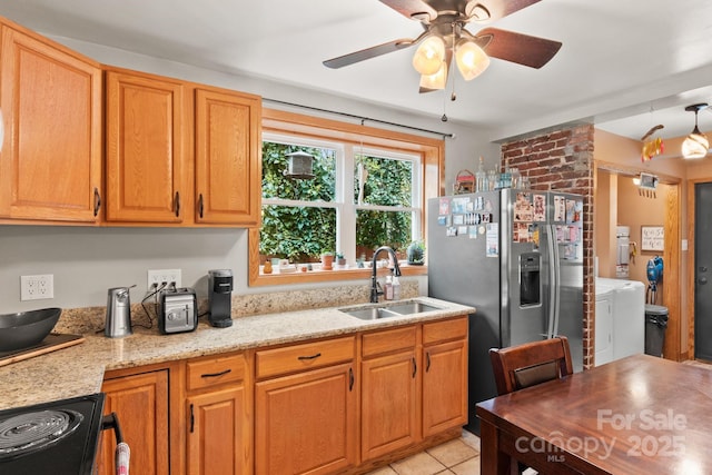 24 Enka Orchard St, Candler, NC 28715 - kitchen featuring light stone counters, a sink, black range with electric cooktop, stainless steel refrigerator with ice dispenser, and ceiling fan