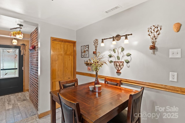 24 Enka Orchard St, Candler, NC 28715 - dining area featuring visible vents