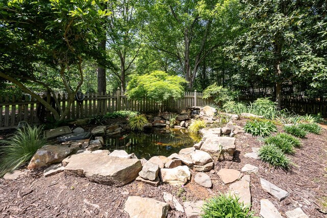view of yard with fence