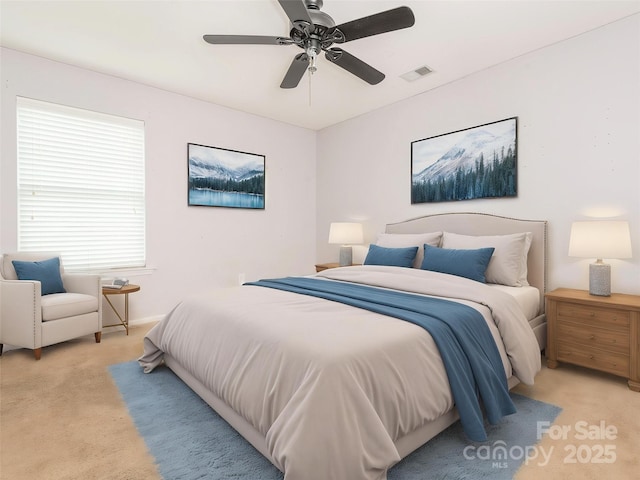 bedroom featuring carpet flooring, visible vents, and ceiling fan
