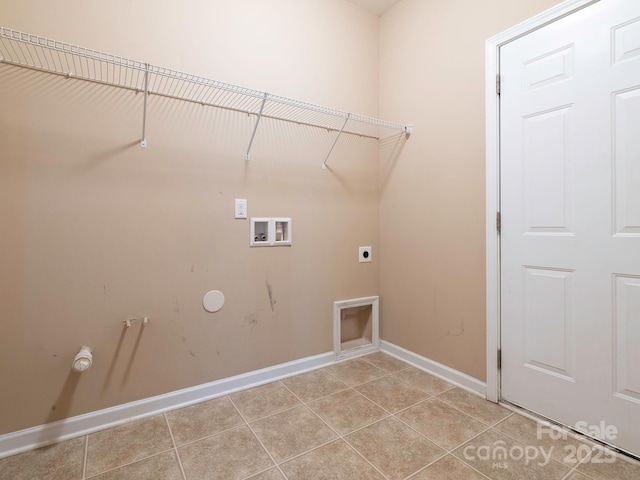 laundry room with hookup for an electric dryer, light tile patterned flooring, laundry area, hookup for a washing machine, and baseboards