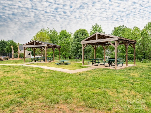 surrounding community featuring a lawn and a gazebo