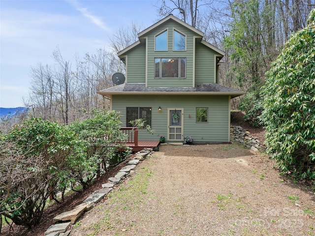 rear view of house with a deck