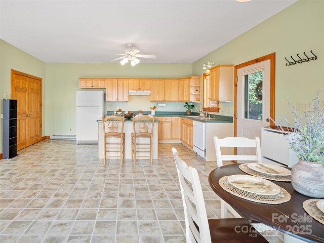 kitchen with light brown cabinetry, under cabinet range hood, open shelves, white appliances, and baseboard heating