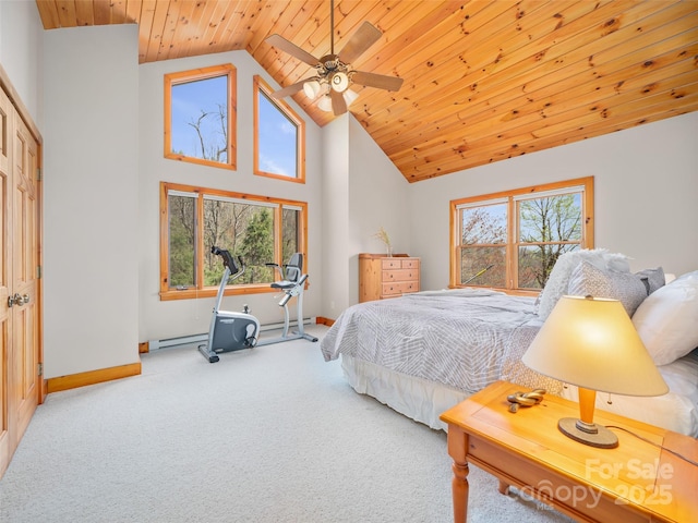 carpeted bedroom with baseboard heating, high vaulted ceiling, a ceiling fan, wood ceiling, and baseboards