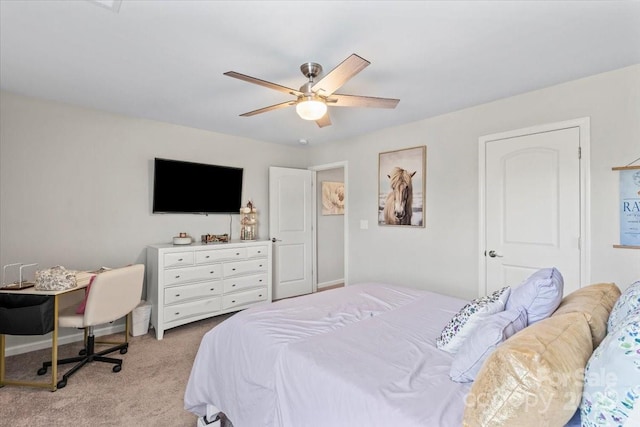 bedroom with light carpet and a ceiling fan