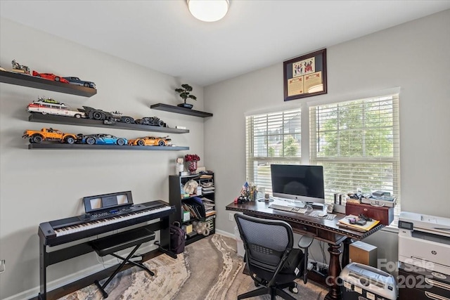 office area featuring baseboards