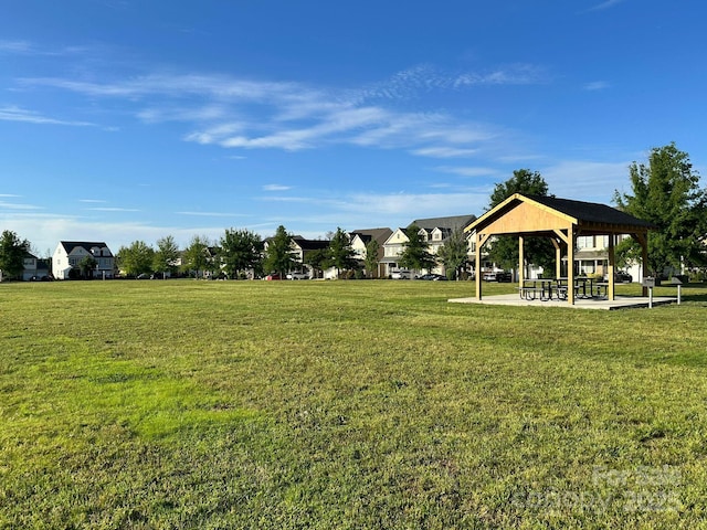 view of home's community featuring a gazebo and a yard