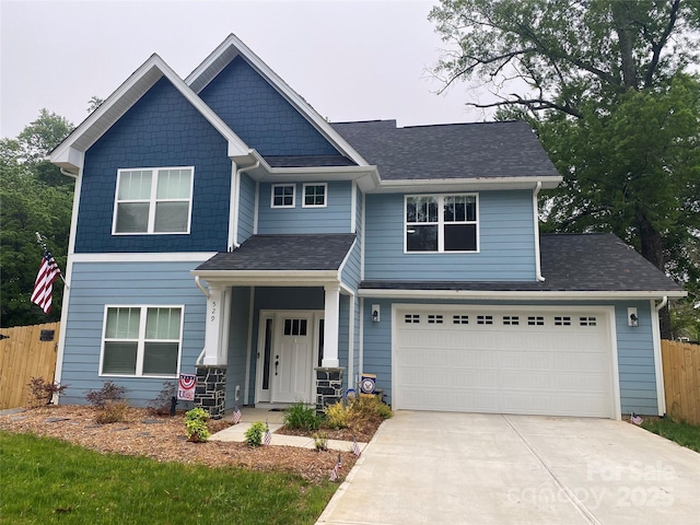5733 Selkirk Dr, Hickory, NC 28601 - craftsman house featuring fence, concrete driveway, and a shingled roof